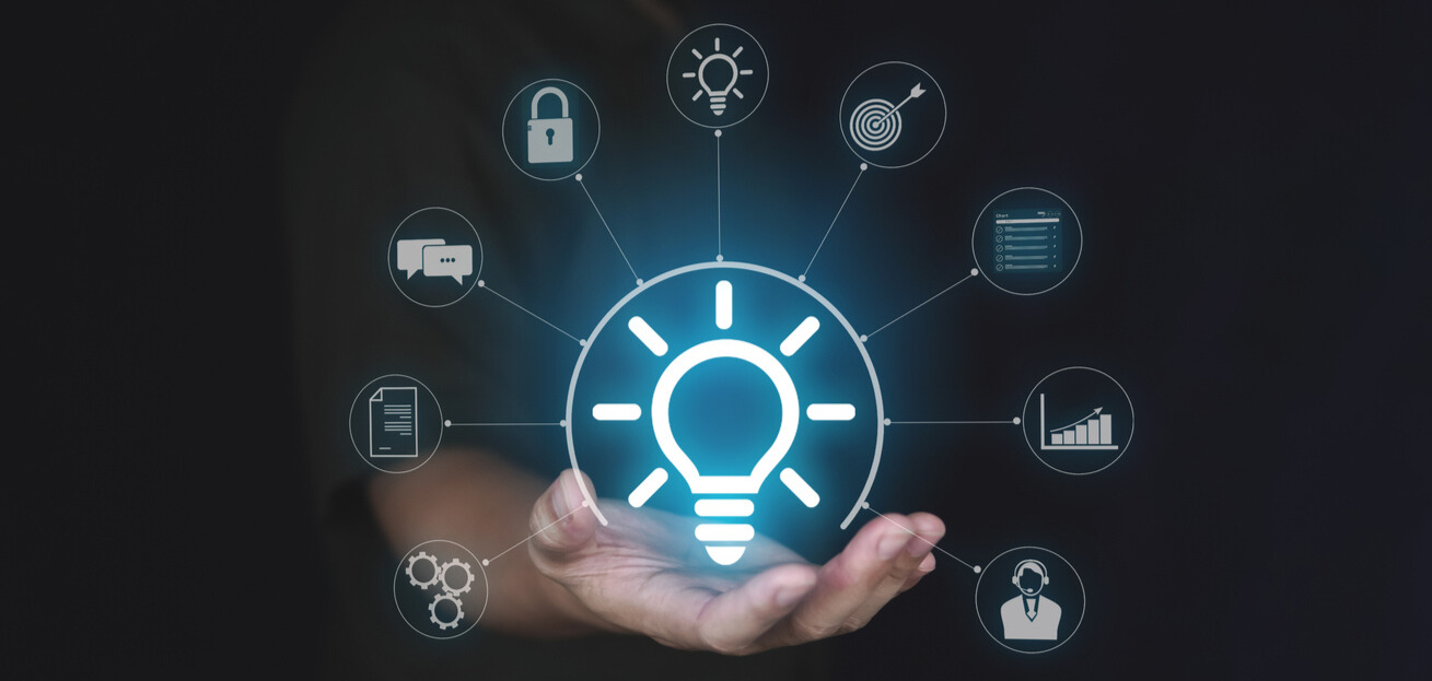 A futuristic lightbulb with ai ideas around it in holograms